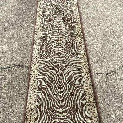 G124: 2'x7' Brown Print Rug
