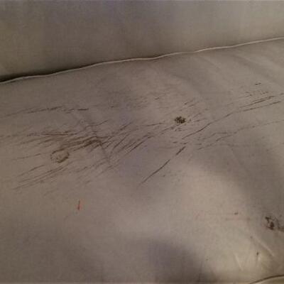 Lot #141  Teal Leather Sofa - some damage