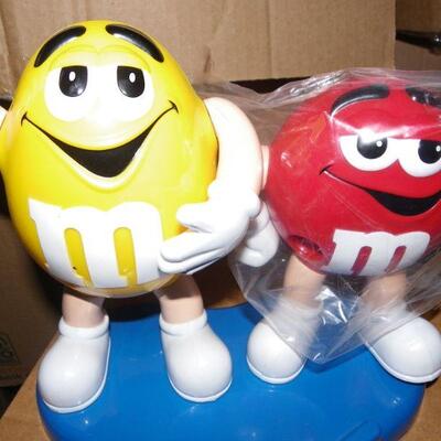 " Original M&M Candy despenser with movable arms.