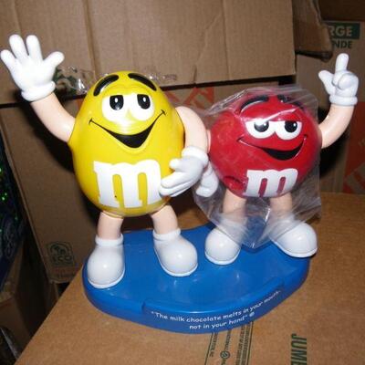 " Original M&M Candy despenser with movable arms.