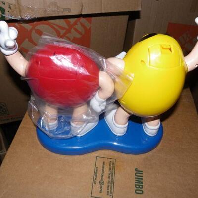 " Original M&M Candy despenser with movable arms.
