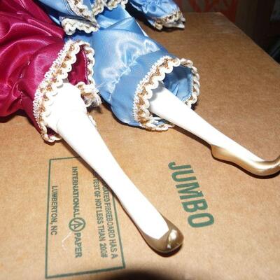 ' Porcelain female clown doll, 10 inches.