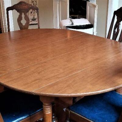 Lot #190  Dining Room Table with Four Vintage Chairs