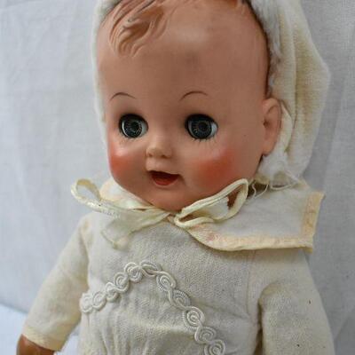 Vintage Doll, plastic. Green Eyes, Cream Outfit. Needs cleaning