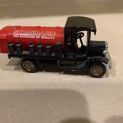 Vintage chevron oil trucks 