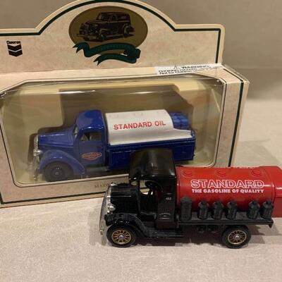 Vintage chevron oil trucks 