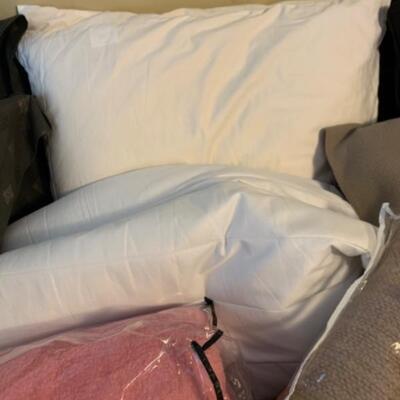 19. Bedding (two sets) of pillows, shams, duvet covers, comforters and blankets