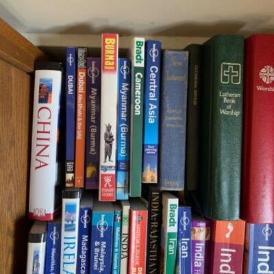 38. Collection of books (travel, religious, maps, etc.)
