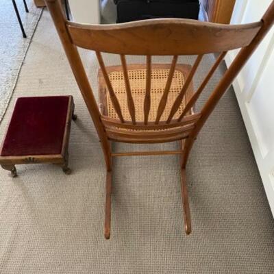47. Vintage oak rocker with cane seat and foot stool