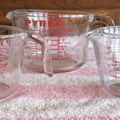 Three Pyrex Glass Measuring Cups