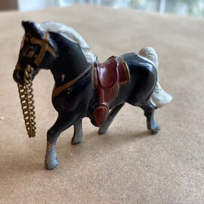 Miniature horse with  chain rein 