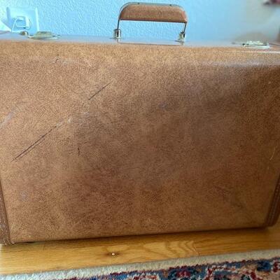 High gloss hard shell vintage suitcase