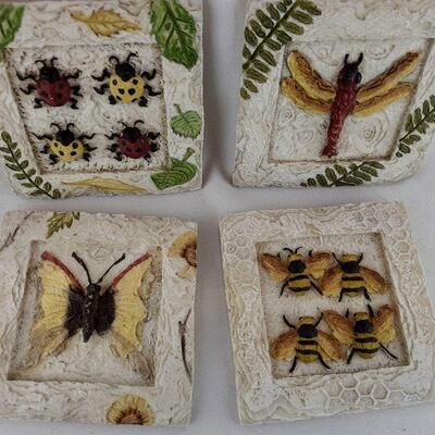 Four Hanging Resin Garden Plaques