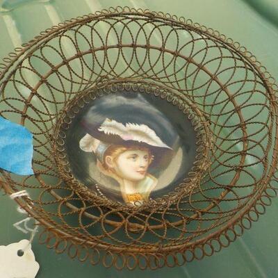 "1800's wire art and hand painted Princess". 