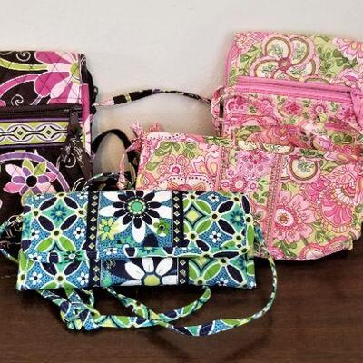 Lot #210  Four Vera Bradley purses/wallets - gently used