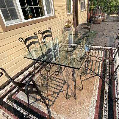 Gorgeous glass and metal dining table w 6 chairs