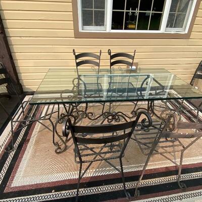 Gorgeous glass and metal dining table w 6 chairs