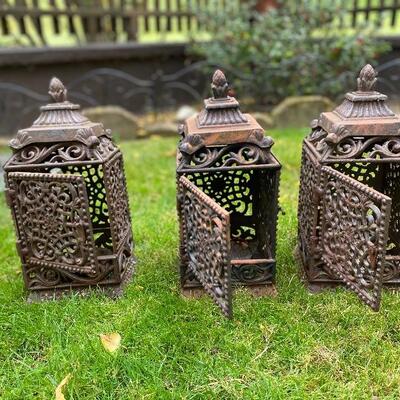 3 antique metal Indonesian candle holders