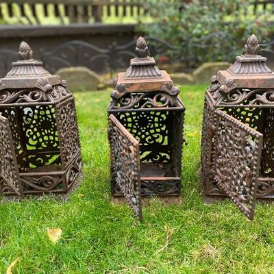 3 antique metal Indonesian candle holders