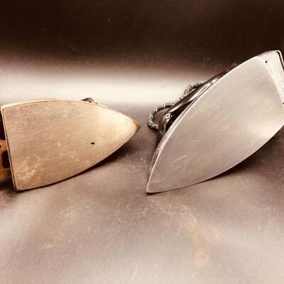 Two Vintage irons Automatic wood handled heavy clothes iron.