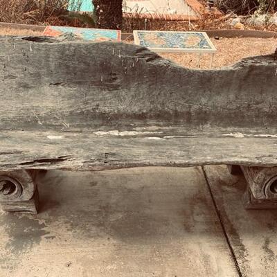 Carved rustic bench from a single log