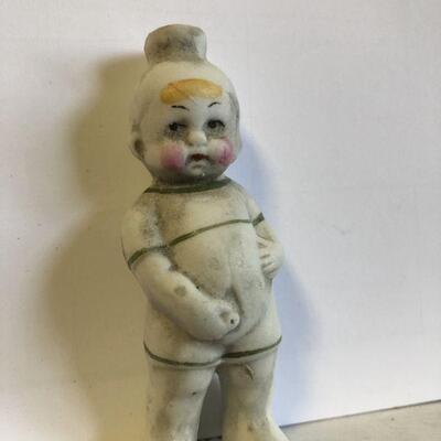 Porcelain Naughty Boy Figurine
