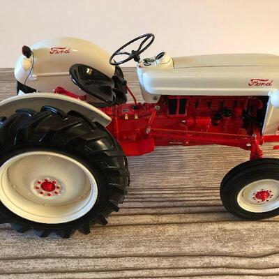 L10: Red and White Ford Tractor