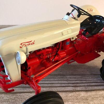L10: Red and White Ford Tractor