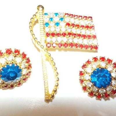 Hi Fashion Costume jewelry American Flag pin and clip on ear rings.