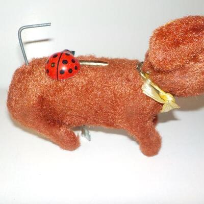 " 1950's Tin wind up dog made in Japan".