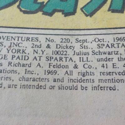 2 Tarzan and Strange Magazines".