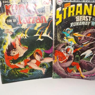2 Tarzan and Strange Magazines".