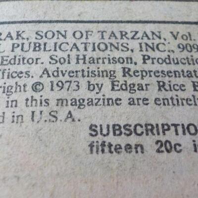 2 Tarzan and Strange Magazines".