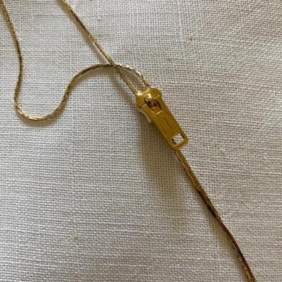 Gold tone zipper necklace 