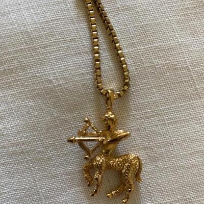 Sagittarius gold tone pendant 