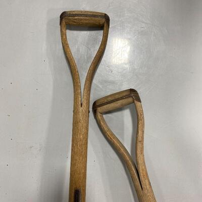.83. Two Split Wood Antique Shovels