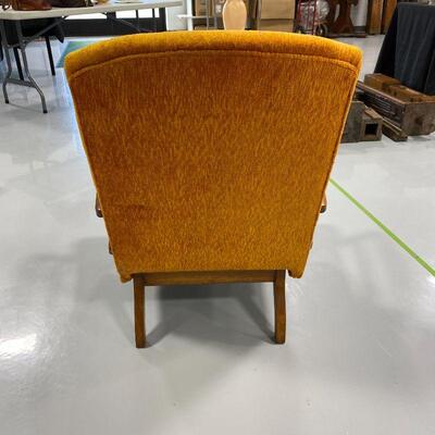 .121. MCM Plush Orange Bounce Rocker Chair