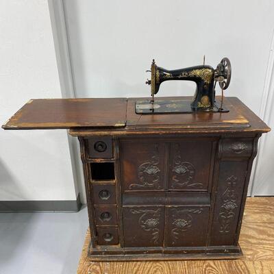 .125. Elegant Wood Sewing Machine Cabinet