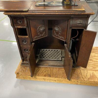.125. Elegant Wood Sewing Machine Cabinet