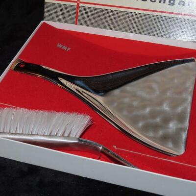 Solid dust pan and sweeper