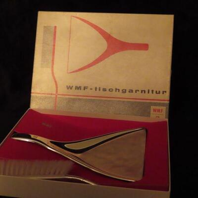 Solid dust pan and sweeper