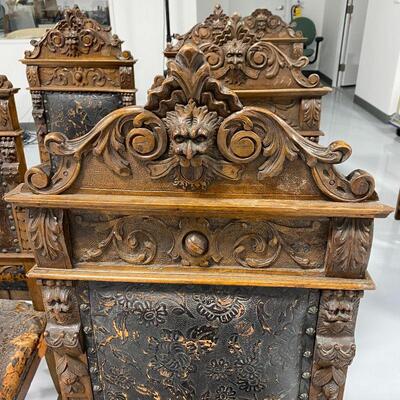 .139. Set of 8 Carved Lions Head Chairs