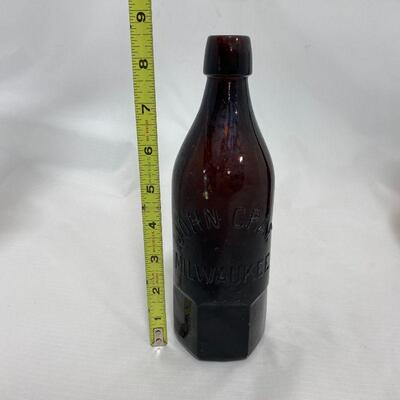.145. Three Wisconsin Brewery Bottles