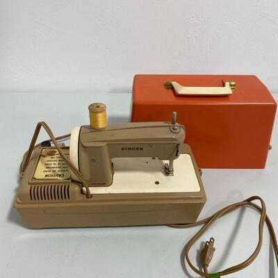 .166. Two Children's Sewing Machines