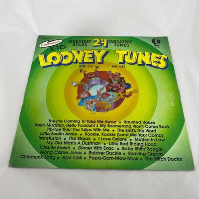 .168. Seven Looney Tunes, Buggs Bunny, Chipmunks, Smurf Albums