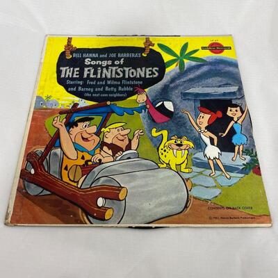 .168. Seven Looney Tunes, Buggs Bunny, Chipmunks, Smurf Albums