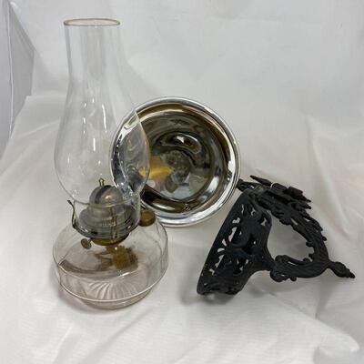 .183. Oil Lamp with Cast Iron Wall Bracket & Mercury Glass Reflector