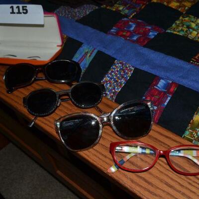 LOT 115. FOUR PAIR OF SUNGLASSES AND ONE SUN GLASS CASE