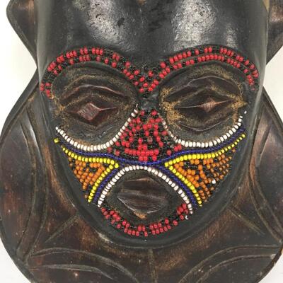 Lot 62 - Pair of Masks with Beads