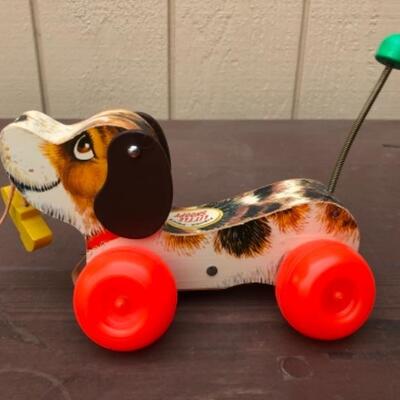 Lot 239: Little Snoopy: Pull and Play, Fisher Price Toys, Dog with Shoe in Mouth